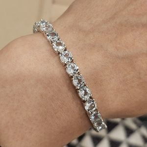 Sky Blue topaz tennis bracelet, 925 Sterling silver, rhodium plated, 7.25".